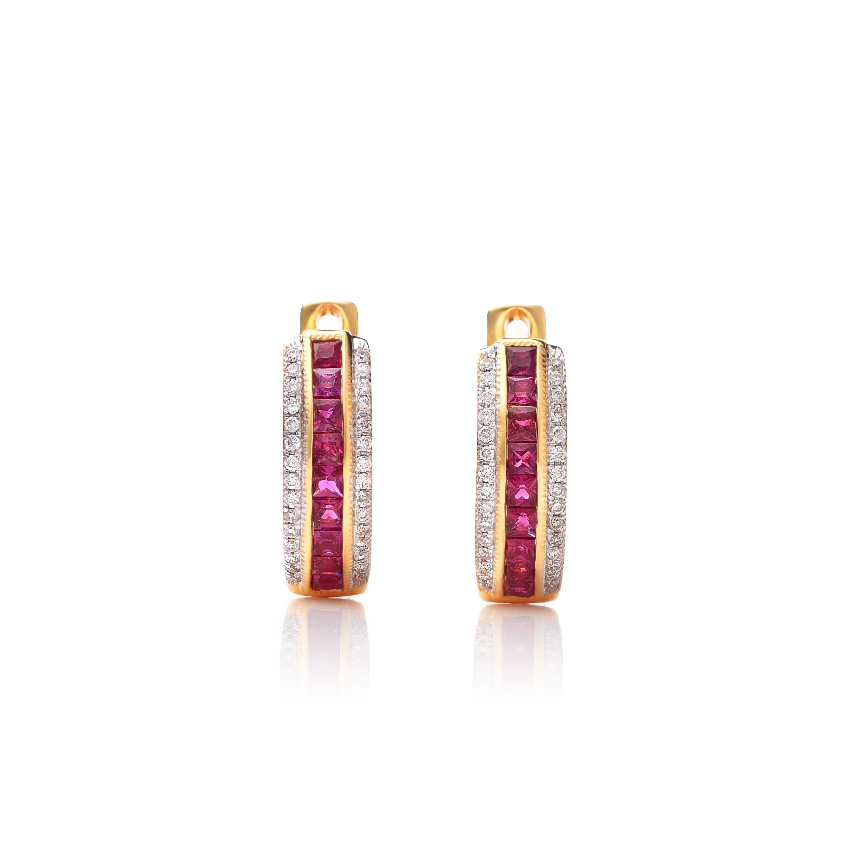 Découvrez l'allure vibrante de ces boucles d'oreilles en rubis naturel, d'un poids total de 0,63 carats, serties dans un riche or jaune 14K. Accentuées par 0,17 carats de diamants brillants, ces boucles d'oreilles allient une beauté intemporelle à