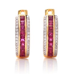 Natural Ruby Gemstones 0.63 carats set in 14K Yellow Gold Earrings with Diamonds