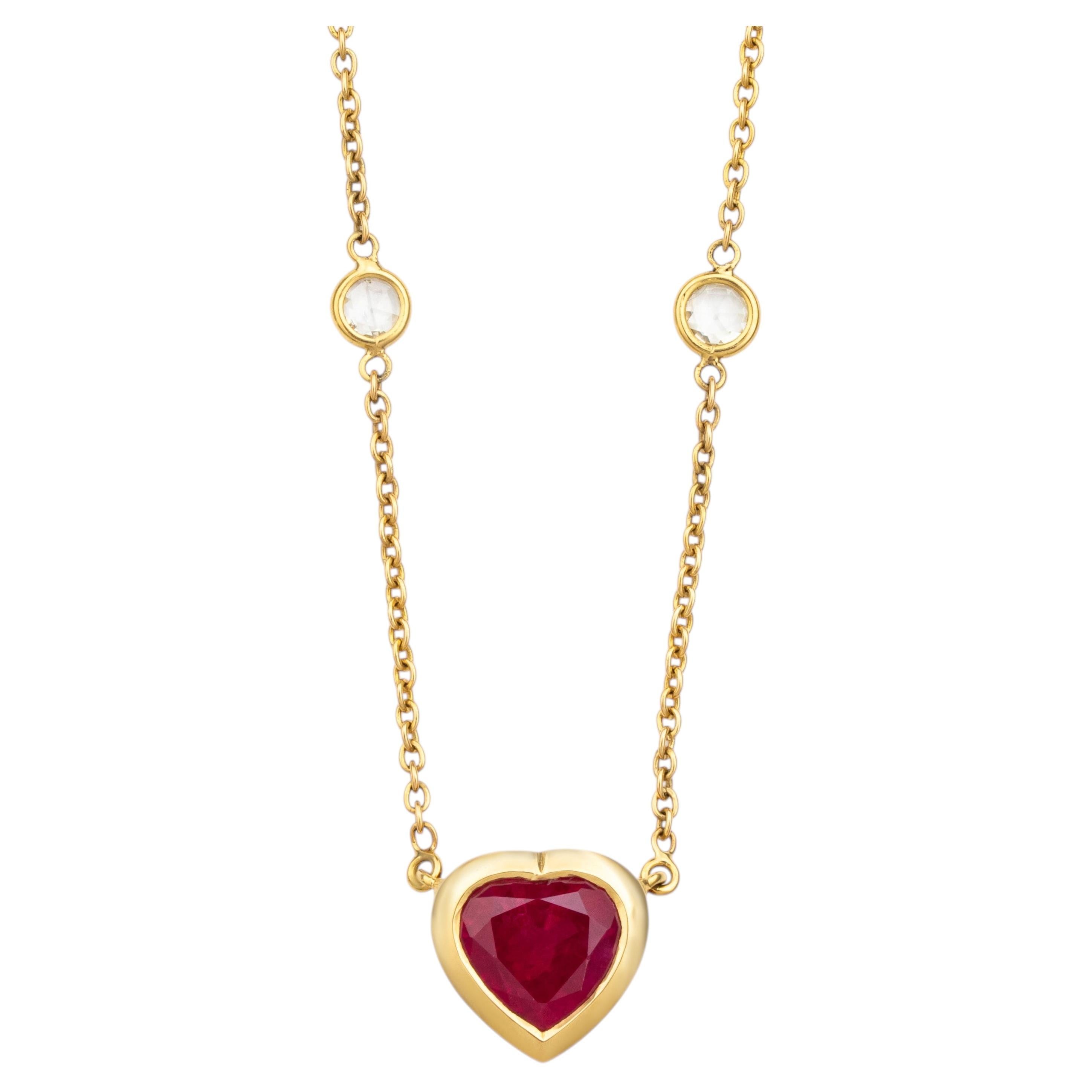 Contemporary Heart-Shaped Ruby Pendant Necklace with Bezel-Set Diamonds in Gold