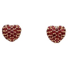 Natural  ruby heart shape studs in 14k gold