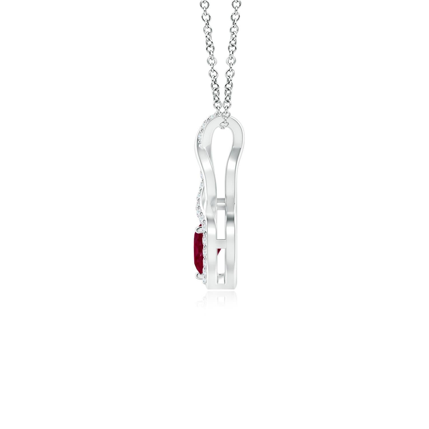 A diamond studded strip entwines with a lustrous metal strip to form an ornate infinity. Floating amid the graceful infinity is a heart-shaped bold red ruby in a prong setting. The sparkling diamonds infuse a captivating edge to this platinum