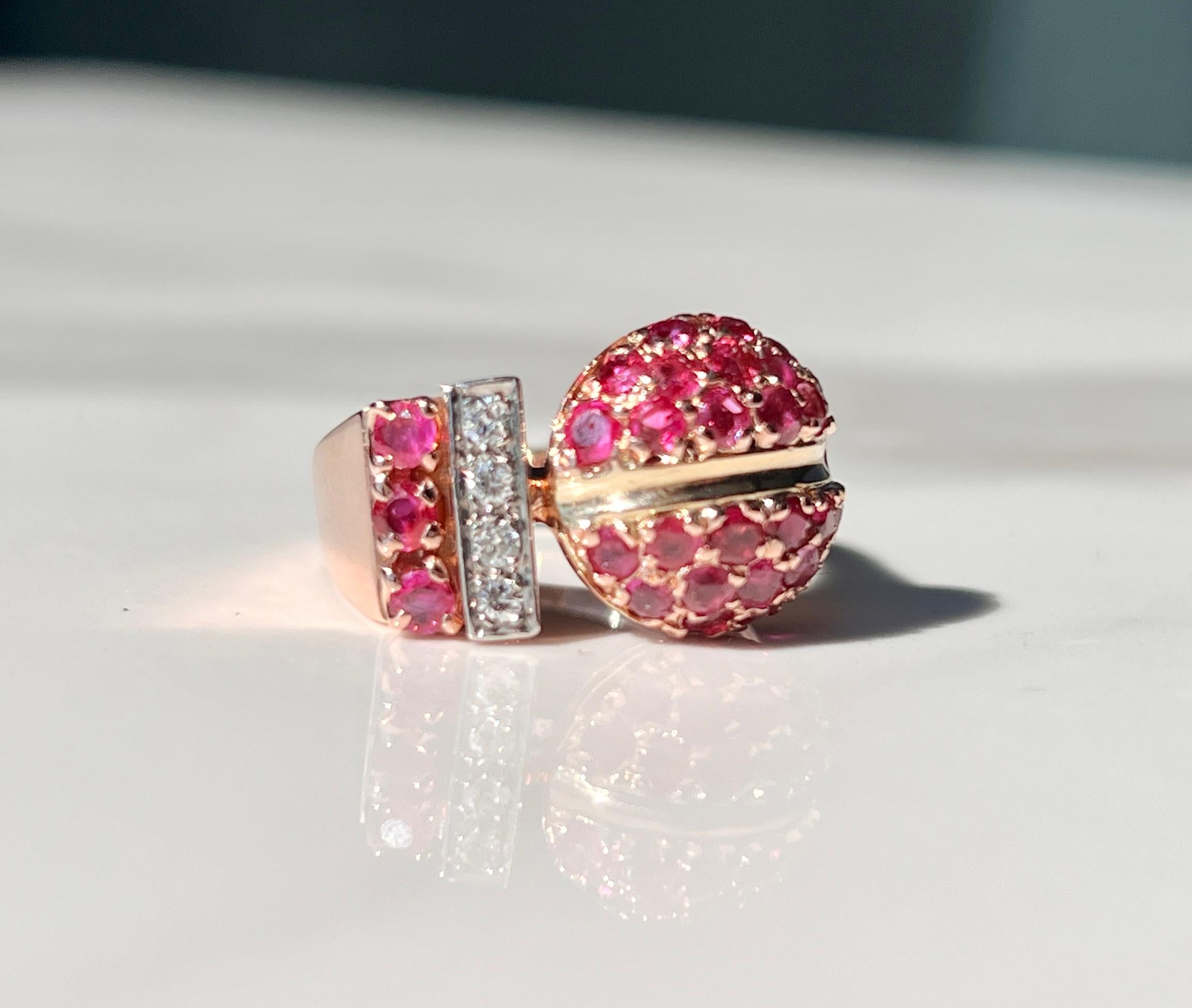 This retro ruby ring is ostentatious, bold and beautiful all wrapped into one. Handmade and crafted in solid rose gold and adorn with natural rubies and old cut diamonds. 

This emblematic ring is a truly bespoke piece of the 60 & 70's and cannot be