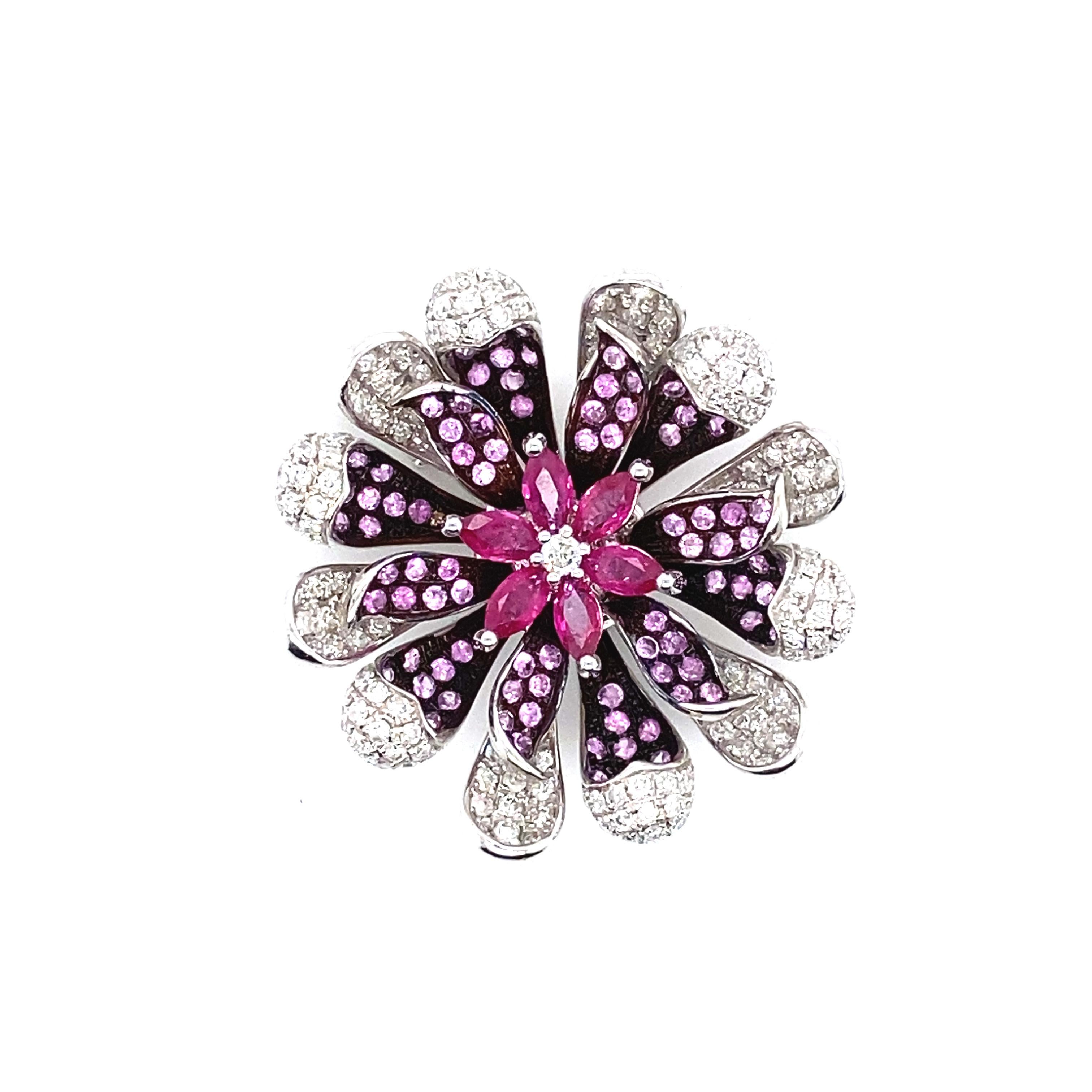 A beautiful Brooch/Pendant set in 18K White Gold featuring 0.85 Carats Natural Rubies, 0.80 Carats Pink Sapphire and 1.15 Carat Diamonds. Rubies are referred to as 