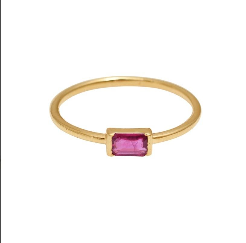For the slayer in you! Made with 14K Solid Yellow Gold and 0.32 Carat Ruby Natural Gemstone! The symmetric ruby placed in the gold bezel gives this ring that chic look that you want to pull up! This can be worn on a daily basis and also on special
