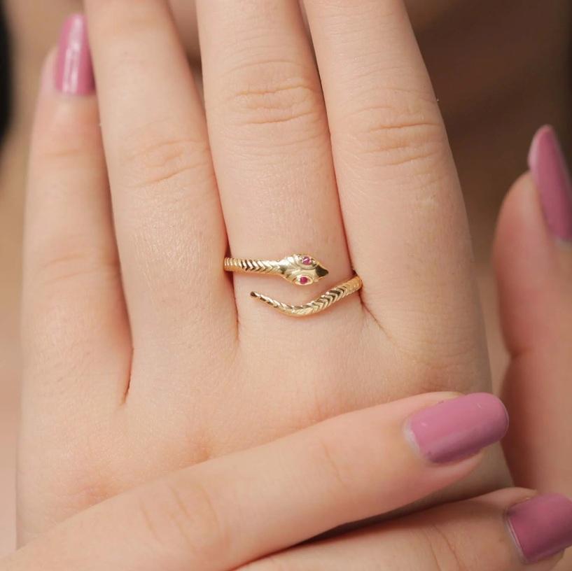 This is a unique, one-of-a-kind snake ring, and handcrafted with a 18k yellow gold ruby gemstone, ruby eyes to stand out of crowd.

Specifications:

Dimensions: Ring Size-7.25, 10*2 mm
Gross Weight: 2.460 gms
Gold Weight: 2.4448 gms
Gold Purity: 18K