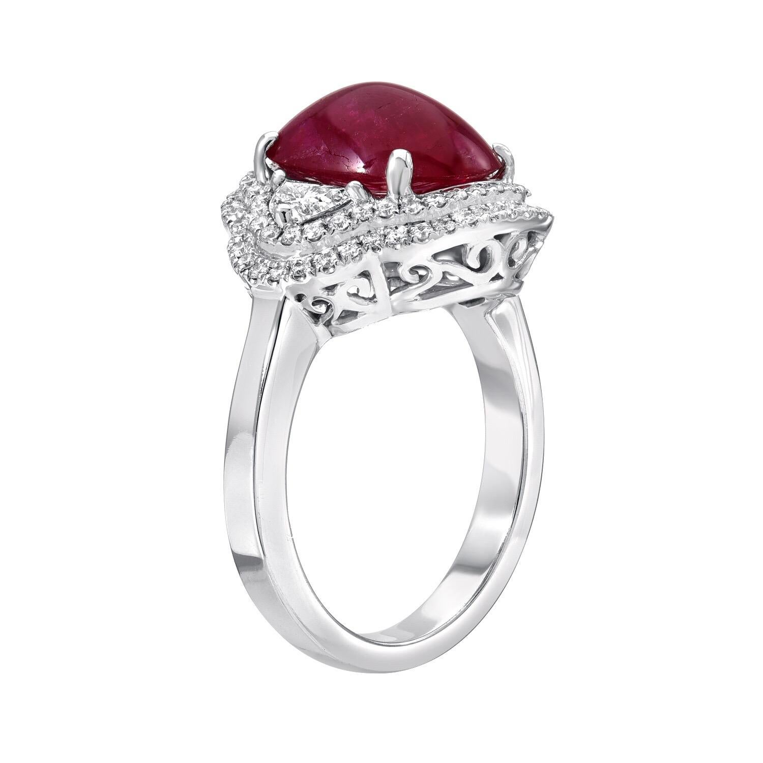 Natural Ruby ring featuring an unheated 5.00 carat cabochon, adorned by a total of 1.20 carat diamonds, creating this impressive 18K white gold cocktail ring. 
Size 6. Resizing is complementary upon request.
The GIA certificate is attached to the