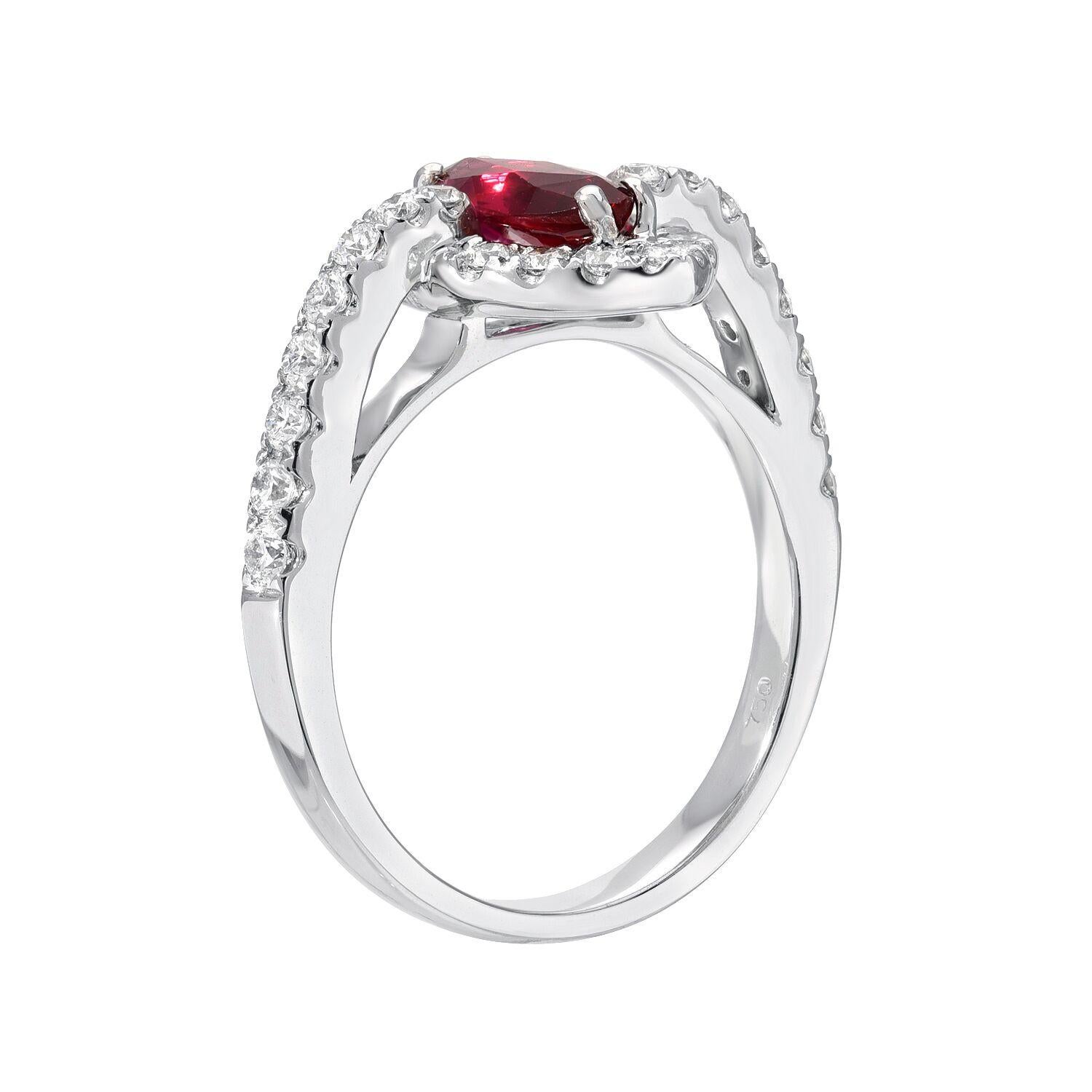 Natural Ruby unheated 1.01 carat marquise, set in a 0.55 carat total, round brilliant diamond and 18K white gold engagement ring or cocktail ring. 
Ring size 6.5. Re-sizing is complimentary upon request. 
The GIA certificate is attached to the