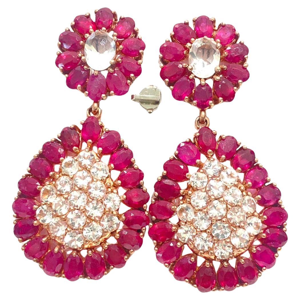 Boucles d'oreilles "Bochic" en or 18 carats et argent, rubis naturel et saphir blanc en vente