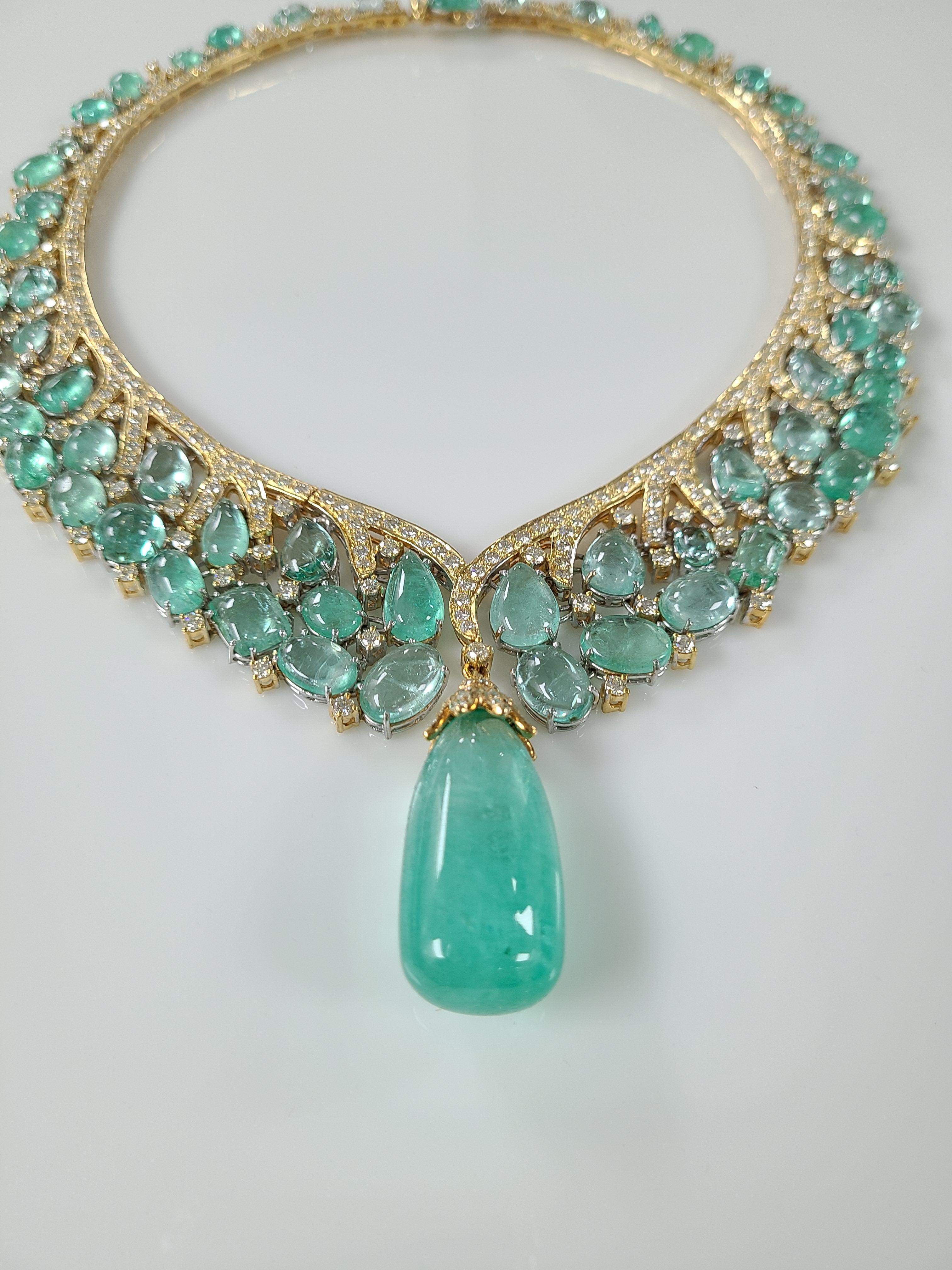A beautiful Natural emerald set in 18k gold with diamonds. The emeralds originate from Russia . The big emerald drop weight is 61.49 carats and emerald cabochons weight is 99.04 carats. The diamond weight is 16.31 carats. The necklace length in cm