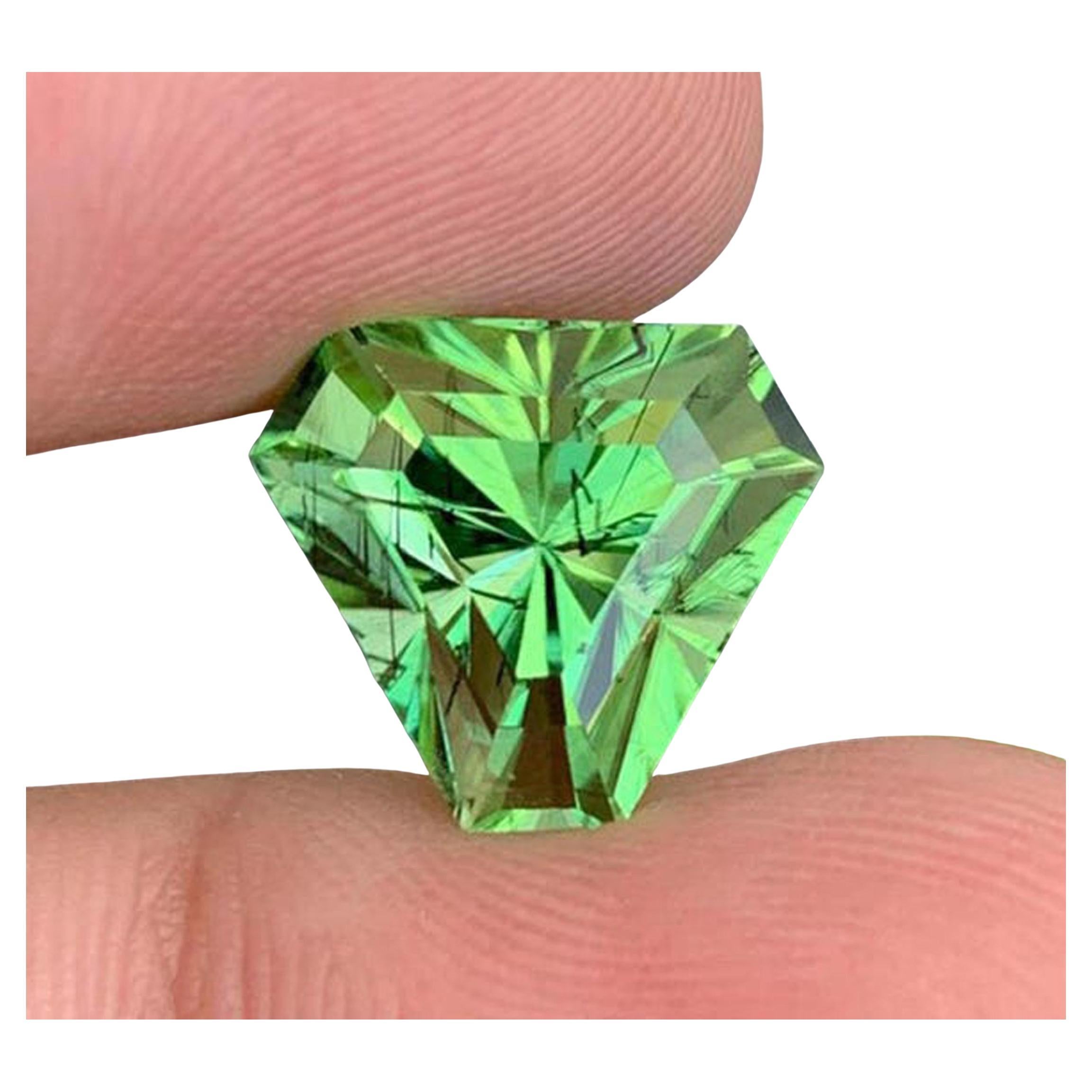 Natural Rutile Peridot Gemstones: 12.24 Carat Trillion Cut Peridot From Pakistan For Sale