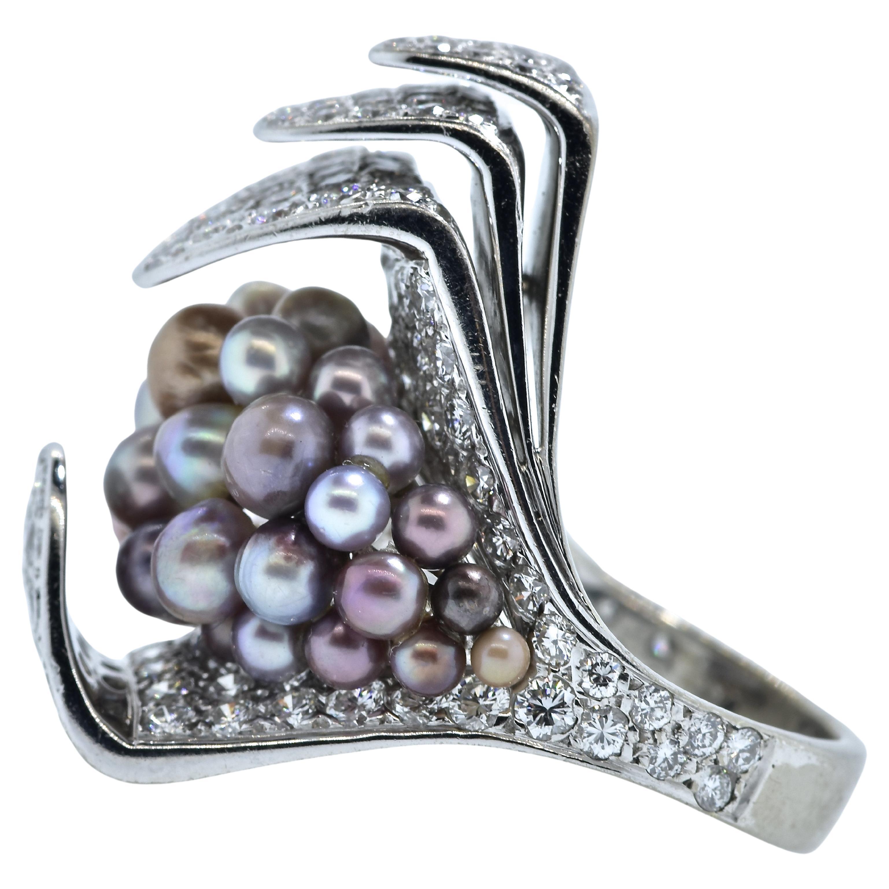Fancy color Natural  saltwater pearls and white diamonds (F) and very very slightly included (VVS) come together to create an outstanding and highly unusual 18K white gold ring.  Wonderful modernistic Large and bold in design, the diamonds are set
