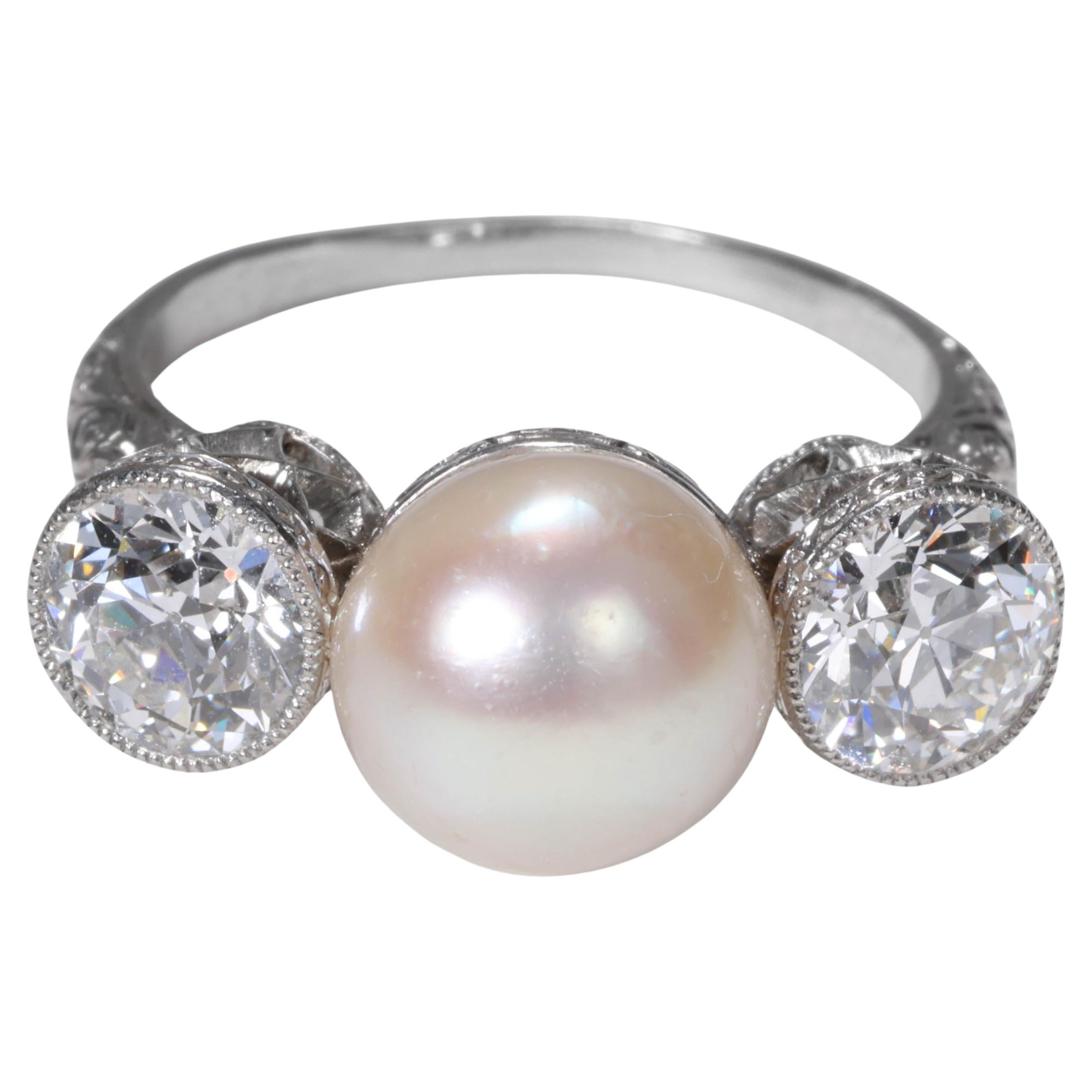 This is a magnificent Edwardian Era (circa 1905) GIA-certified natural (uncultured) saltwater pearl and diamond ring, fabricated by hand in platinum by the oldest jeweler in America, Black, Starr & Frost.

This exquisite and sensuous jewel was