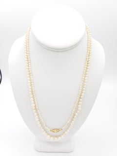 Antique NEW GIA Cert Natural Saltwater Pearl Necklace 42 inches long.