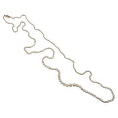 NEW GIA Cert Natural Saltwater Pearl Necklace 42 inches long.