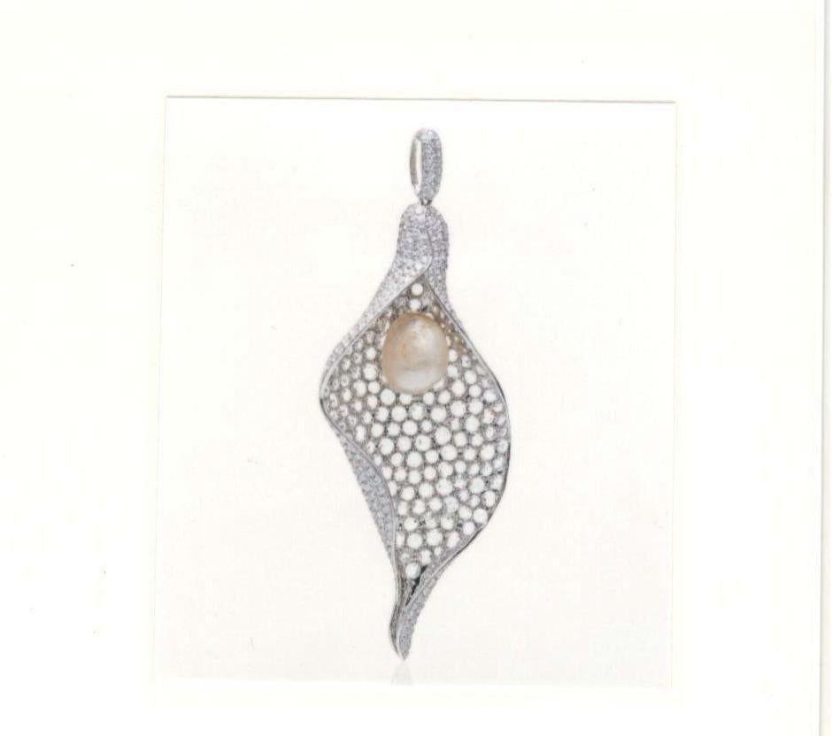 This exquisite necklace features a natural saltwater pearl petal pendant, certified by SSEF Switzerland for its authenticity and quality. The pendant is elegantly mounted with 18 kt white gold, adding a touch of luxury to the design. 

The intricate