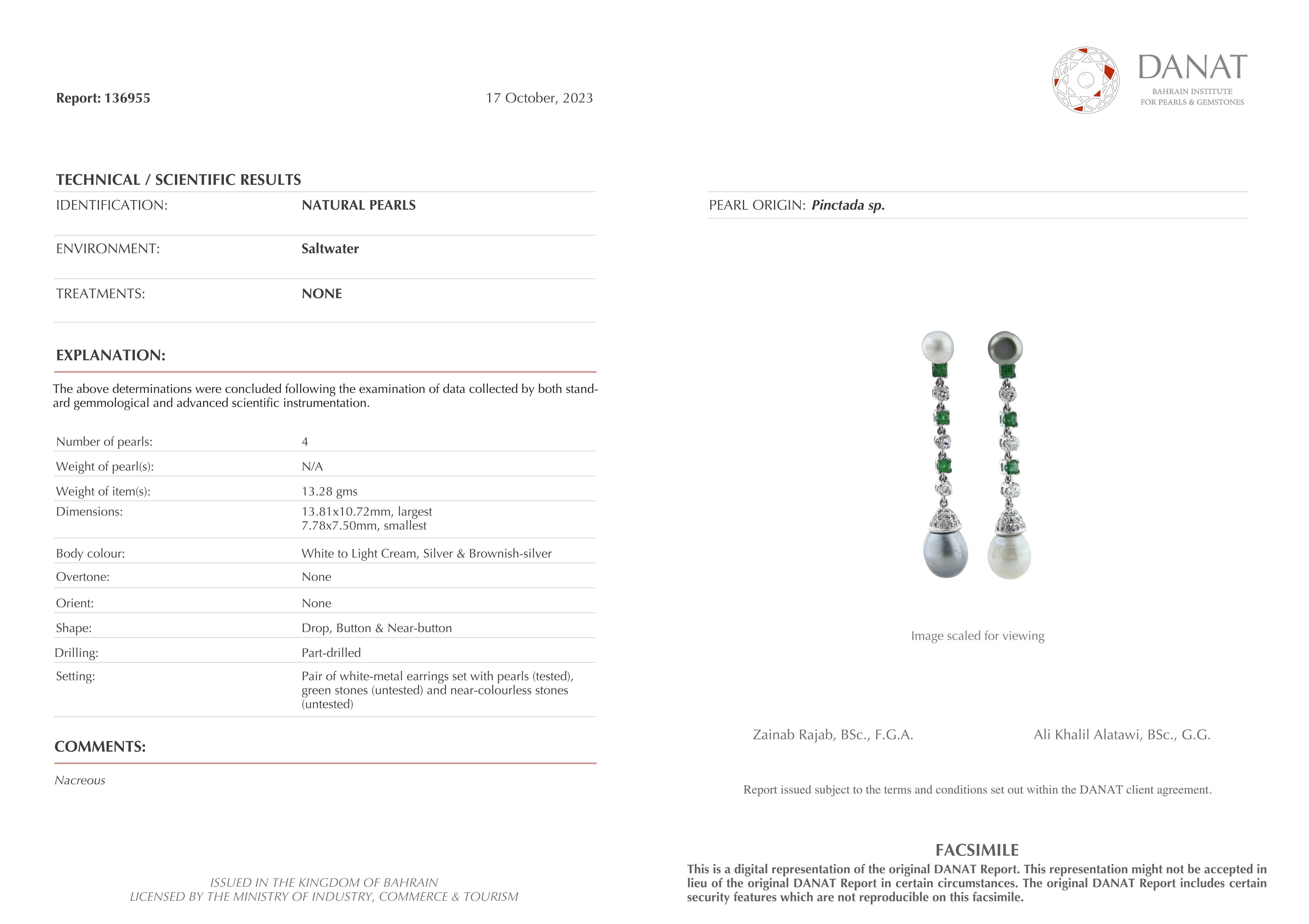 We are pleased to present these exquisite Black & White Natural Saltwater Pearl Earrings, certified by Danat Lab from Bahrain. These stunning earrings are a testament to the timeless beauty and elegance of natural pearls. Each pearl has been