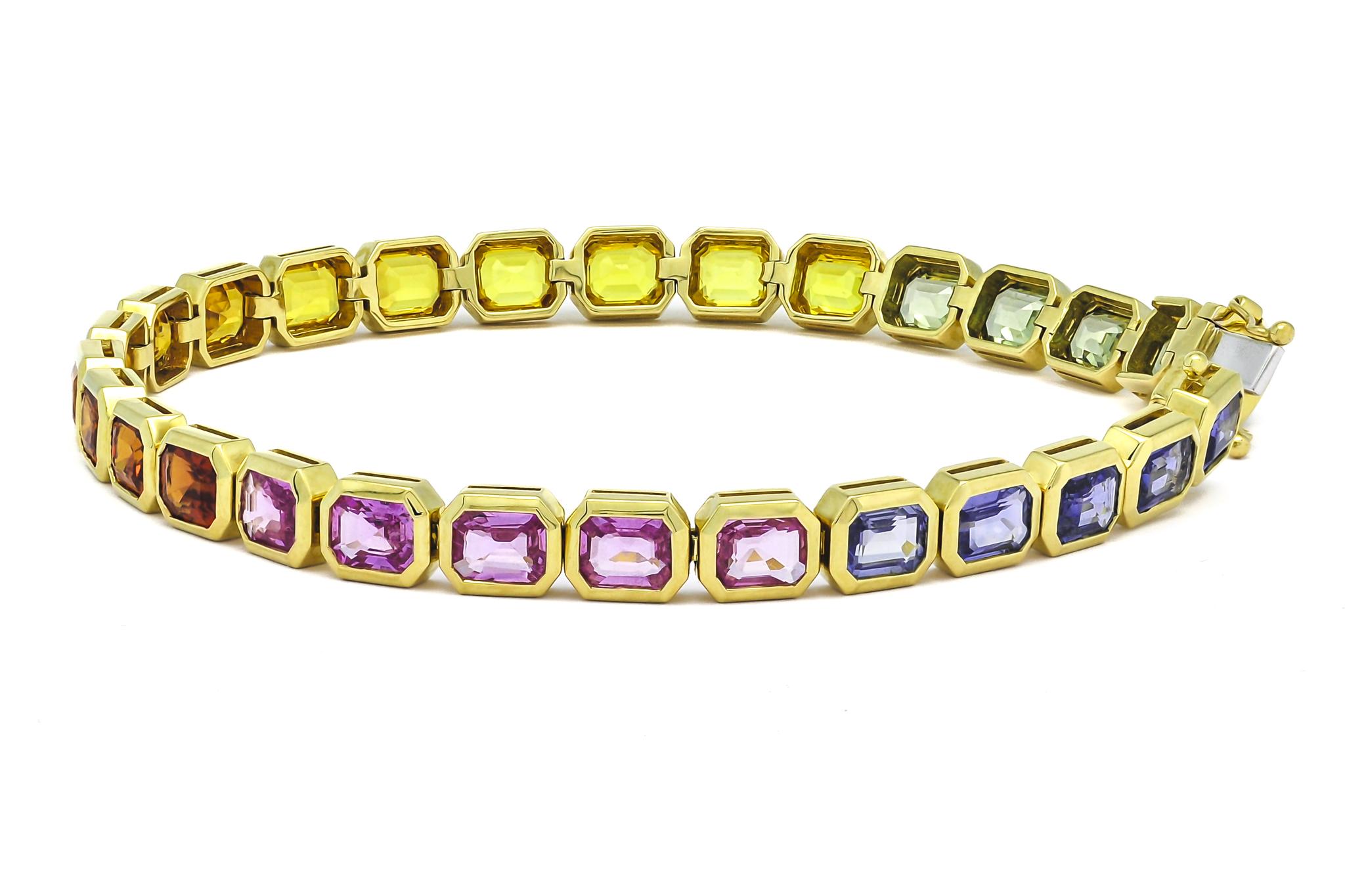 Emerald Cut Natural Sapphire 12.81 carats 18 Karat Yellow Gold Tennis Bracelet  For Sale