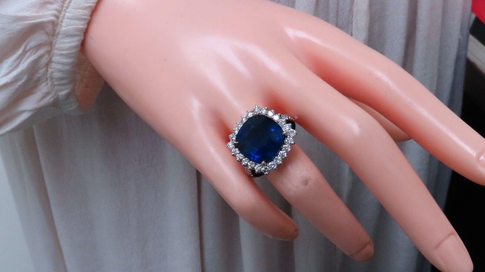 Classic Cluster

GIA Certified 

15.94ct. Natural Blue Sapphire ring.

Report #:  2175627477

cushion cut: 13.96 x 13.72 x 8.91mm

Transparent, Blue



1.75ct. Side natural diamonds &

G color, Vs-2 clarity.

18kt white gold

6.5 grams.

current