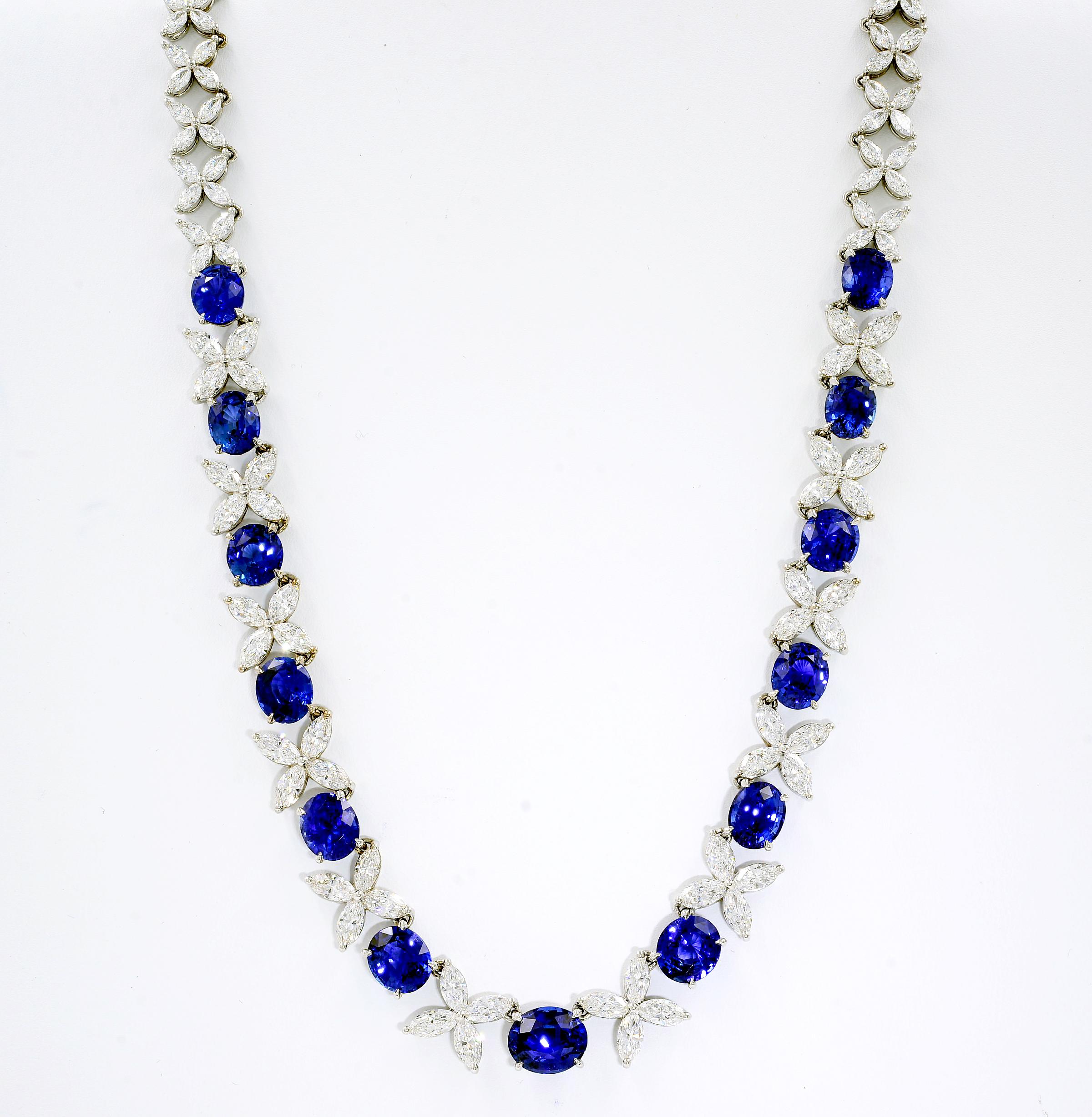Natural Sapphire GIA Cert Diamonds Gold Riviere Necklace 18K White Gold

Stunning riviere necklace featuring thirteen oval cut sapphires and 140 marquise cut diamonds. Oval sapphires are of an amazing royal blue color and are GIA certified (13