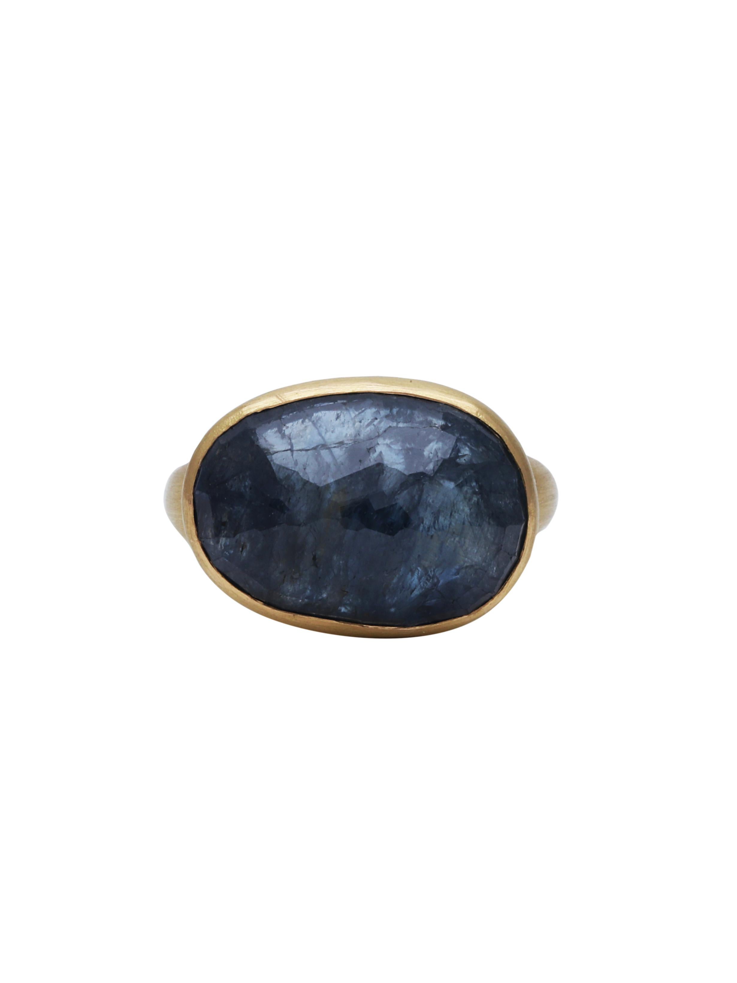 A beautiful ring with a 18.67 carats Natural Sapphire set in 22K Matte finish Gold.
A simple and elegant ring.

Ring Size: US 7.5