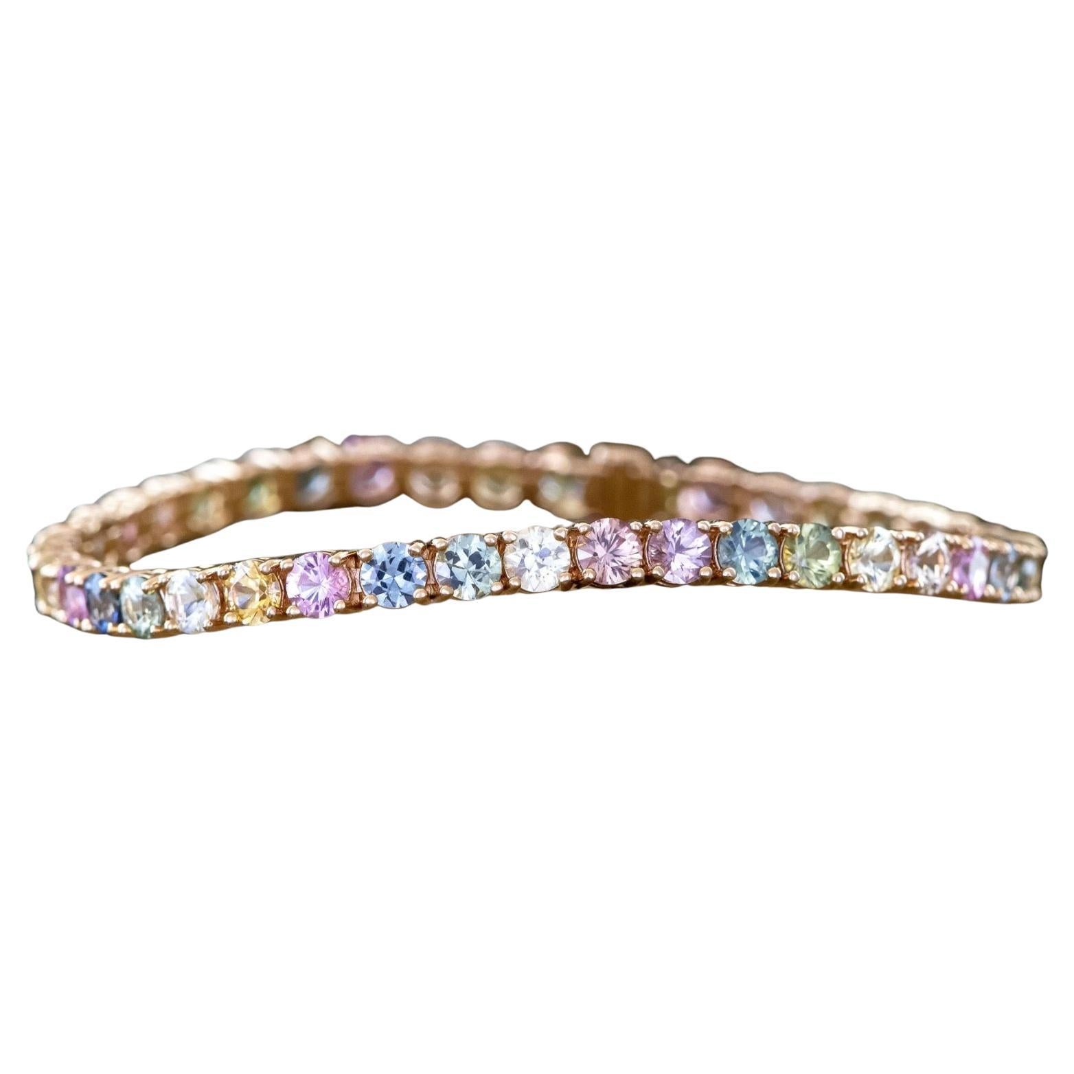 Natural Burma Untreated Multicolor Gem Line Bracelet
Multi-colored sapphires of 3.5mm -3.7mm (9.0 -10.0 carats), this 14K gold bracelet is a true explosion of colors.
Approx. 14g
Round cuts, Excellent clarity
Measures 7 inches (wearable length)
4mm