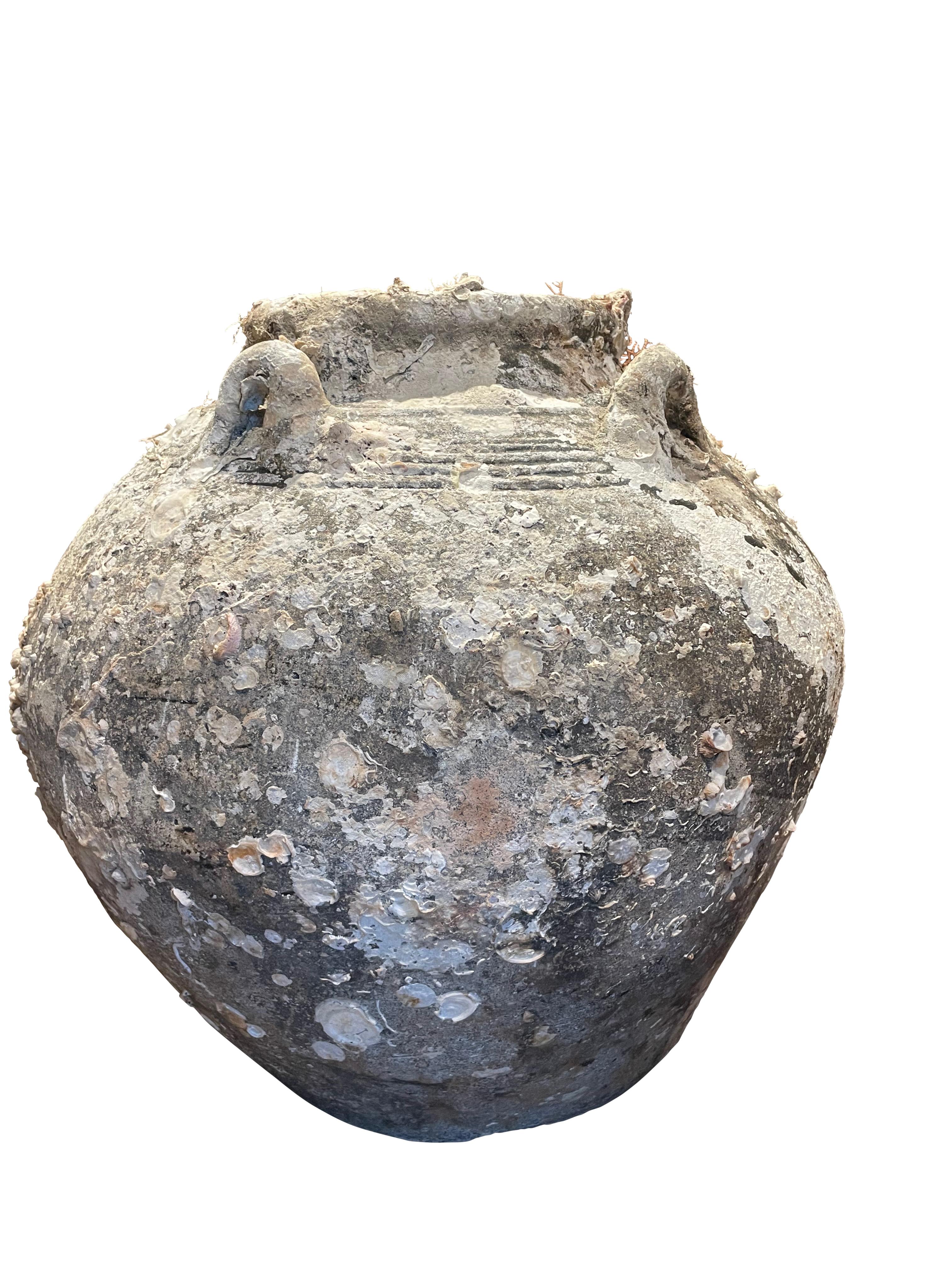 16th century Cambodian vessel found from shipwreck of the coast of Cambodia.
Beautiful natural shells and barnacles from being under water
for hundreds of years.
Museum quality.
ARRIVING MARCH