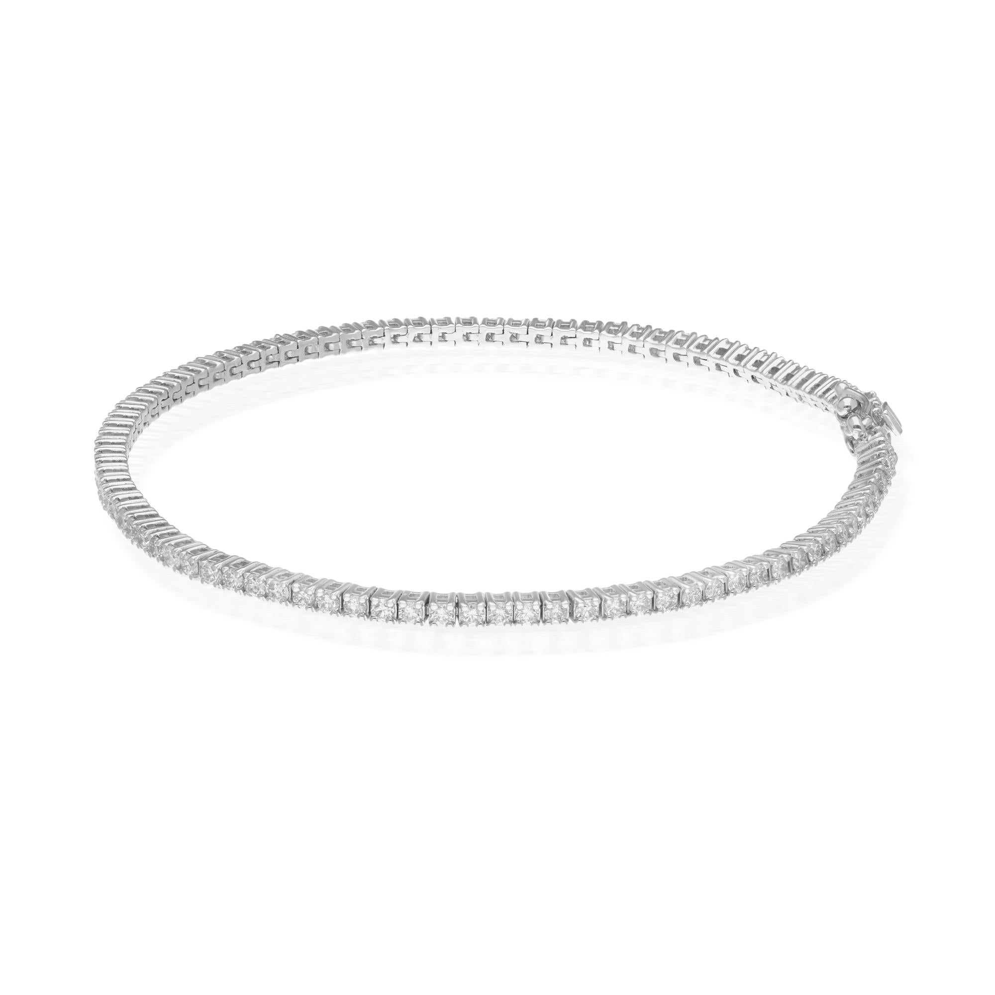 Each dazzling diamond is carefully selected for its superior quality, boasting SI clarity and a lustrous HI color grade, ensuring brilliance and sparkle that captivates with every movement. The diamonds are expertly set in a classic tennis bracelet