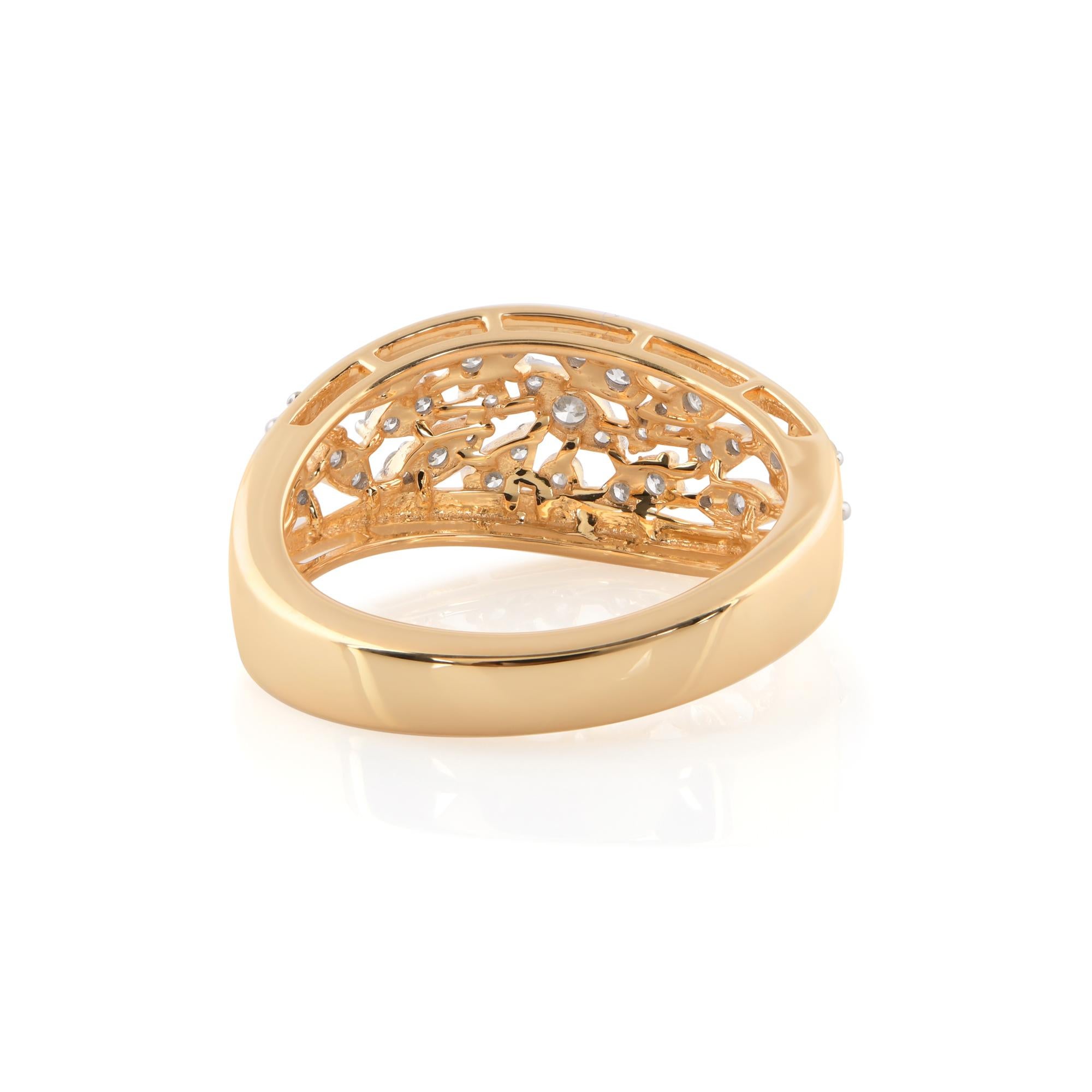 The diamond is securely set within a beautifully crafted 14 Karat Yellow Gold setting, adding warmth and richness to the design. The lustrous gold band showcases intricate detailing, adding an extra layer of sophistication to the piece. The smooth,