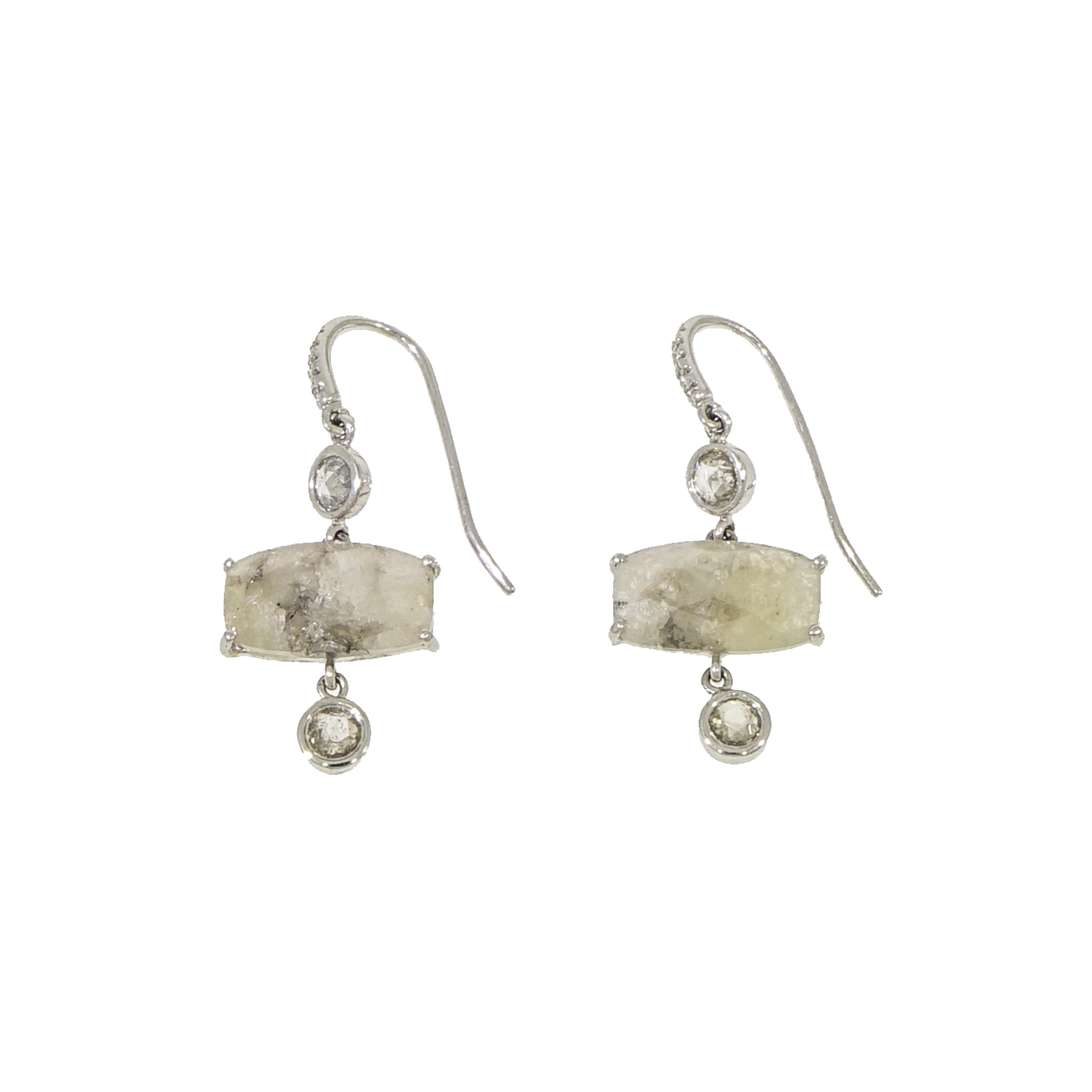 A subtle but impactful drop earrings is a go-to. These earrings are sure to be a hit with both classic and trend-seeking stylish lady. 
Designed and crafted in NYC with a pair of 8.20 carats of Natural Silver Diamonds and complimented by a 0.90