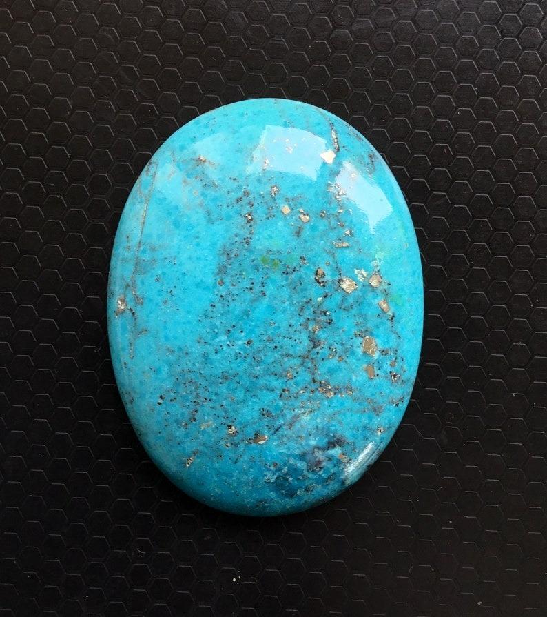 Name: Turquoise Gemstone
Size: 58x44 MM
Weight: 181.40 Carats
Colour: Blue.
Shape: Oval Cabochon
Birthstone: December
Association: Jupiter.
Energy: Rid Of Evil and Negative Power.
Astrology Sign: Sagittarius

About Turquoise Stone:
It considered as