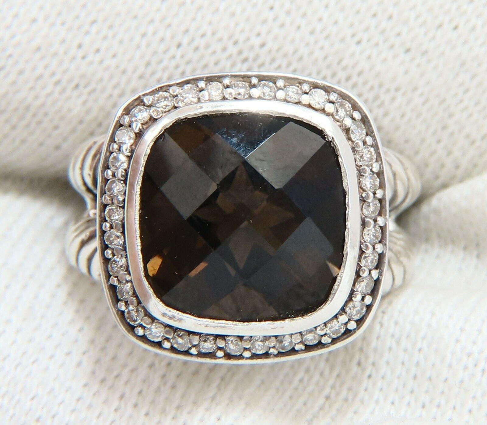 Natural checker board cut Smokey Topaz Ring 

Topaz: 11 x 11mm

Vibrant Vivid Classic Vibrant Brown Smokey Topaz.



.30ct. Side natural round white diamonds:

G- Color, Vs-2 clarity.

Sterling Silver 925

8.8 grams

Ring Current size: 5

Depth of