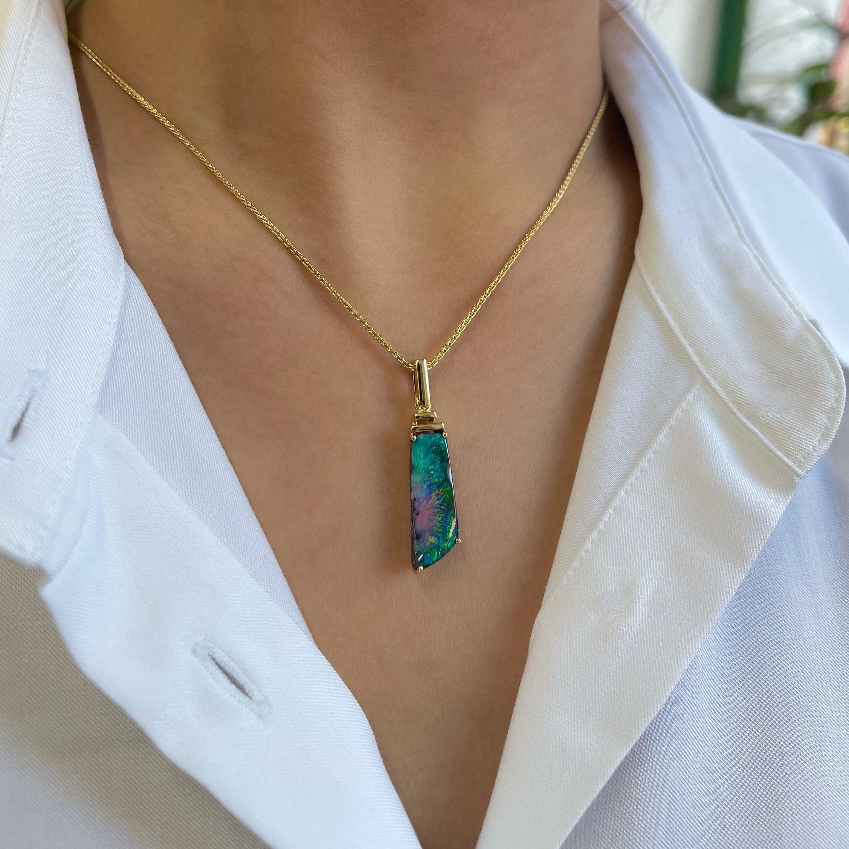 ‘Dazzled by Opal’ is an enrapturing piece with its unique design and the sublime beauty of the boulder opal (8.46ct) sourced from Winton mines in Queensland, Australia. Masterfully crafted in our gorgeous 18K yellow gold, the timelessly elegant