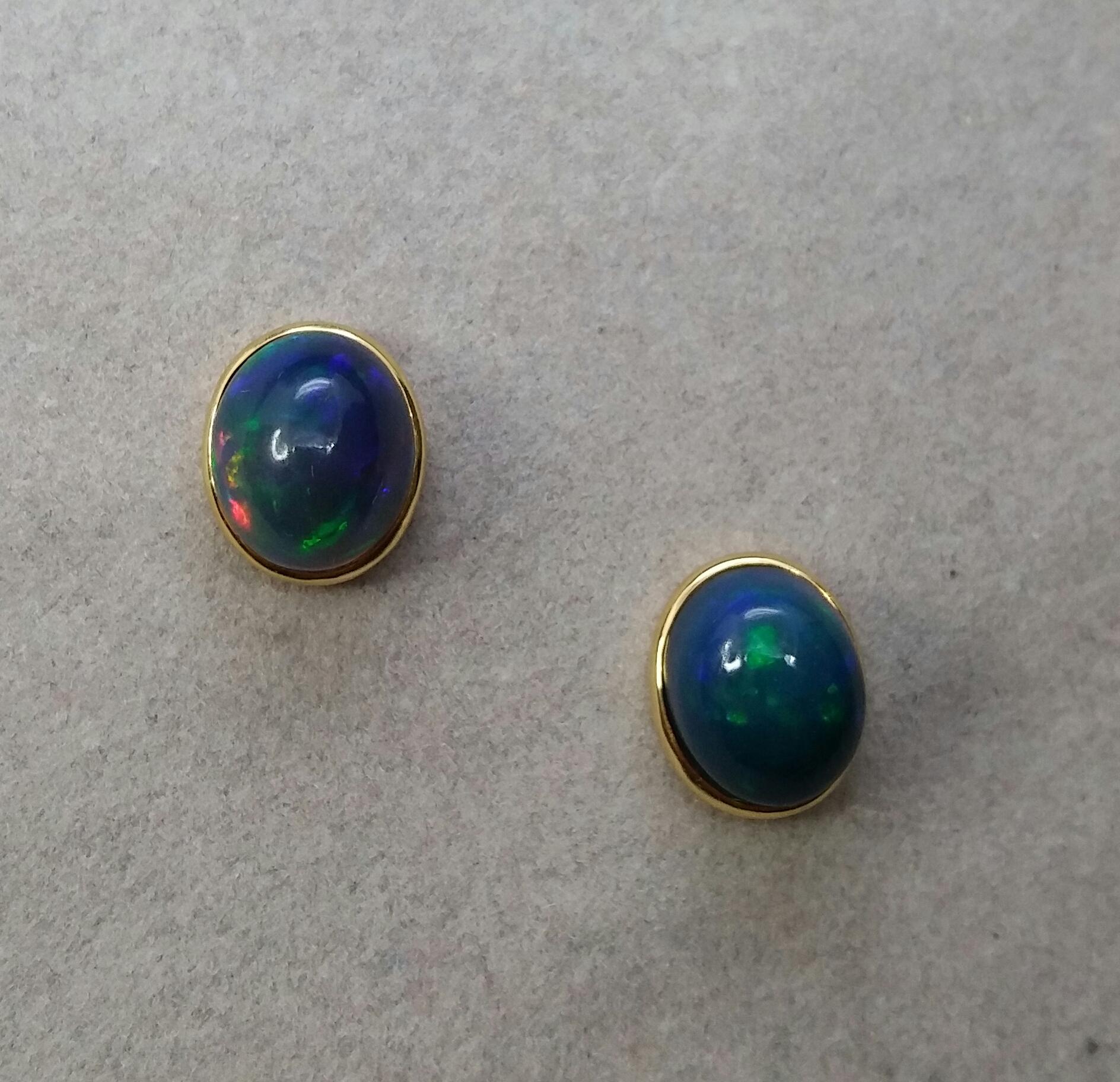 Natural Solid Black Opal Oval Cabs 14 Karat Yellow Gold Stud Earrings In Good Condition For Sale In Bangkok, TH