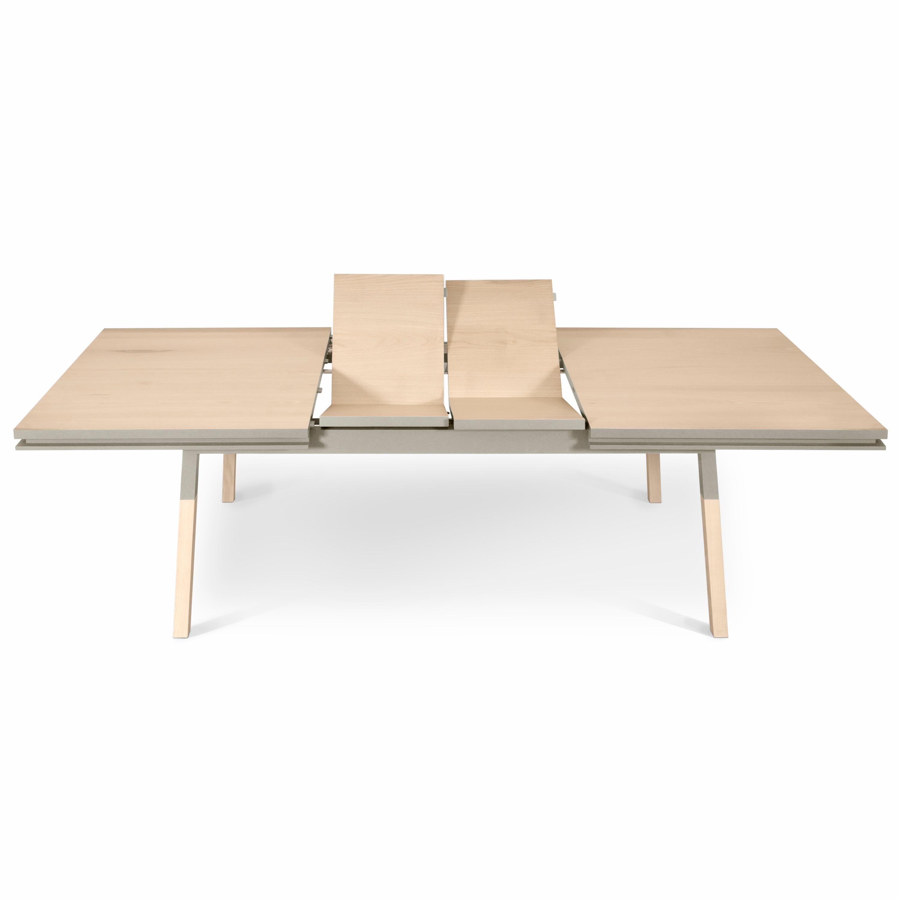 This rectangular dining table is proposed with 2 integrated and folded extensions. 

It is made of 100% solid ash wood from sustainably managed and PEFC certified French forests.

The 3 lengths are 160 cm / 63 inches when the table is closed, 200 cm