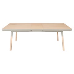 natural solid wood dining table with a light gray finish, design E. Gizard