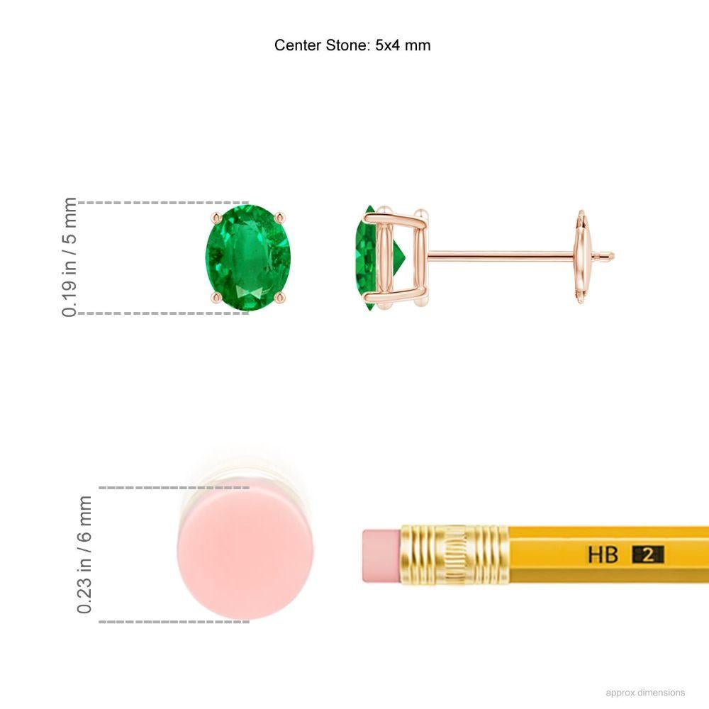 This pair of solitaire emerald stud earrings crafted in 14k rose gold is simple yet stunning. The oval emerald sits in a prong setting and captivates with its rich green hue.
Emerald is the Birthstone for May and traditional gift for 20th, 35th &