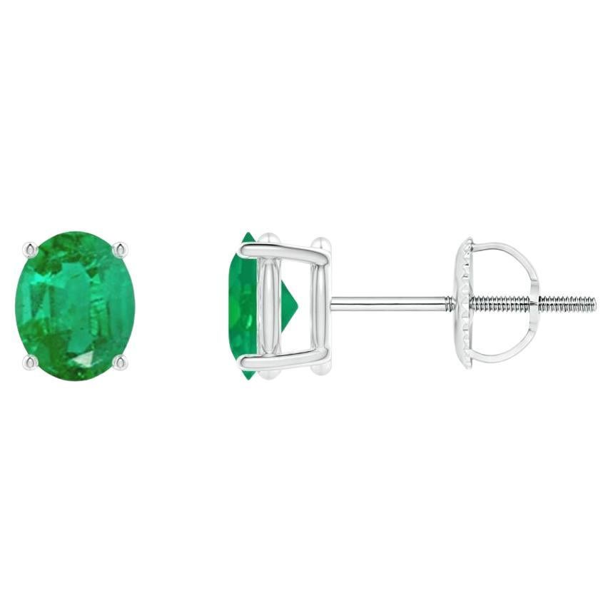 Natural Solitaire Oval 0.60ct Emerald Stud Earrings in Platinum For Sale