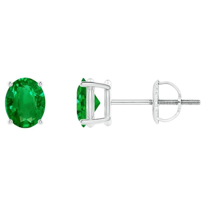 Natural Solitaire Oval 0.60ct Emerald Stud Earrings in Platinum  For Sale