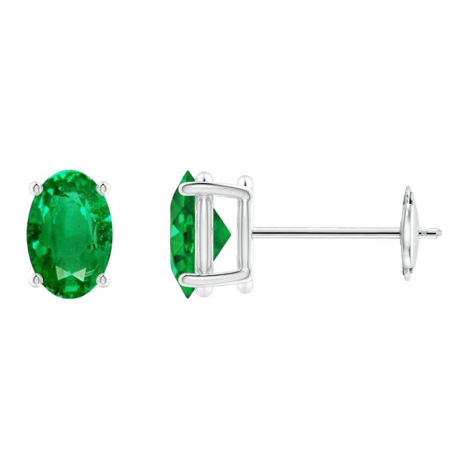 Orecchini a perno con smeraldo ovale solitario naturale da 0,80ct in oro bianco 14 carati
