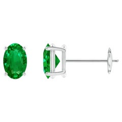Orecchini a perno con smeraldo ovale solitario naturale da 0,80ct in oro bianco 14 carati