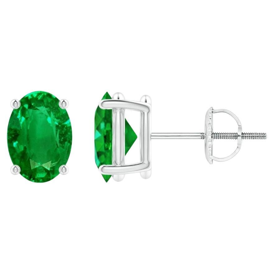 Natural Solitaire Oval Emerald Stud Earrings in Platinum (Size-7x5mm) For Sale