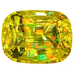 Sfene (titanite) naturale frizzante da 2.62 carati – Taglio fantasia “Rainbow Fire”