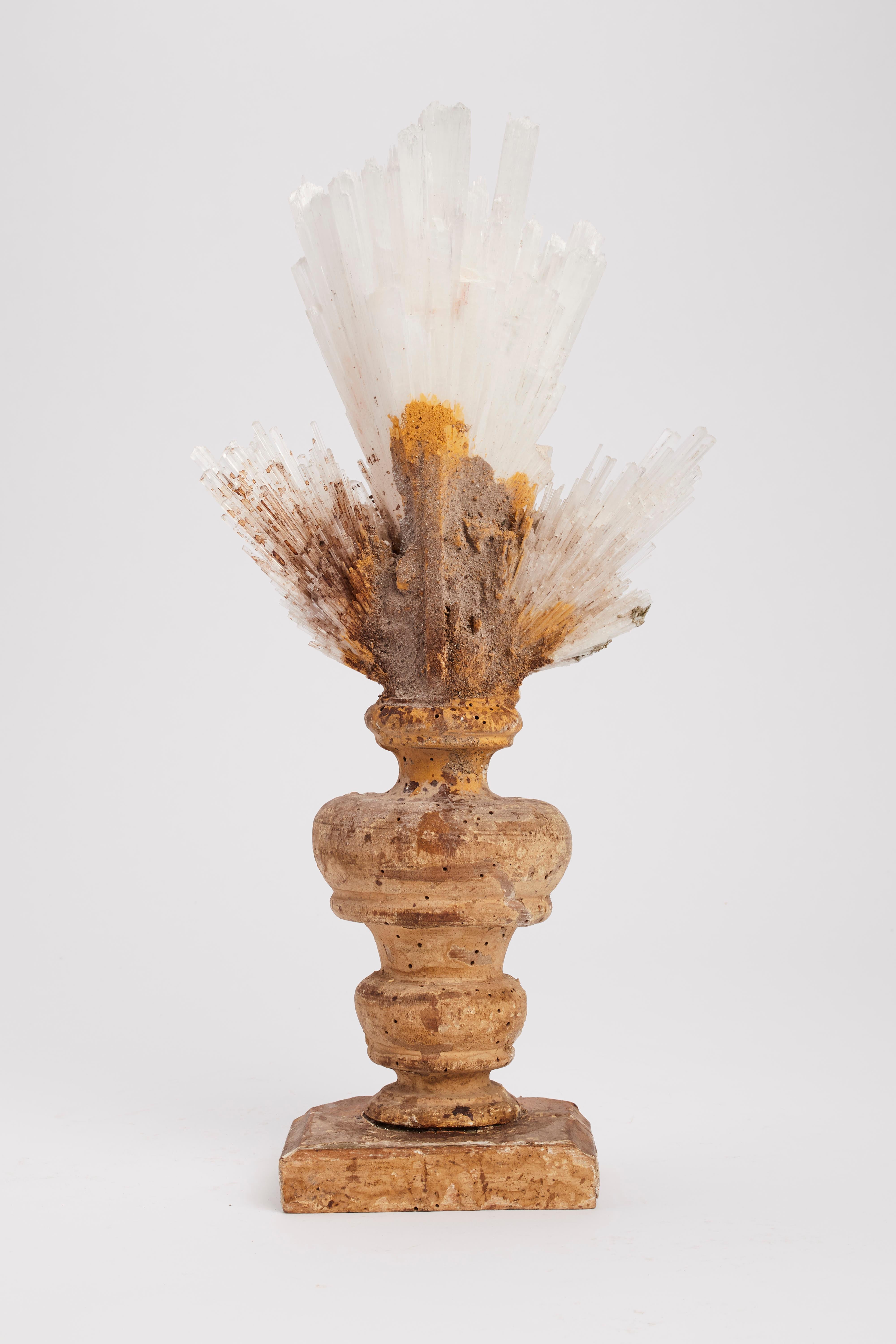 A Naturalia mineral specimen a composition of Scolecite crystals and Calcite flowers, mounted over gold-plated wooden bases, the shape of a vase. Italy, 1880 ca.