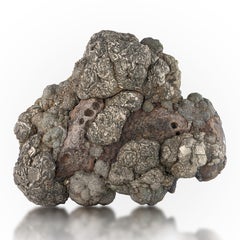 Spécimen naturel de pyrite dorée sur limonite provenant du Pakistan