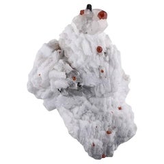 Esemplare naturale di granato di hassonite su albite proveniente dal Pakistan