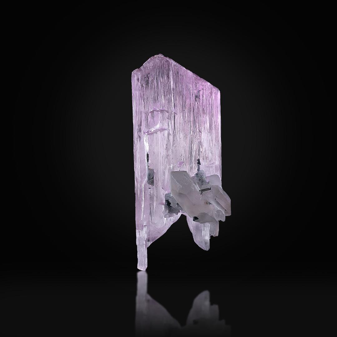 Specimen Type: Kunzite with Tourmaline
Weight: 137 grams
Dimension: H: 9.5 x W: 3.5 x D: 3.3 cm 
Origin: Dara I Pech, Chappa Dara District, Kunnar Province, Afghanistan 
Treatment: None




This natural specimen of Kunzite with Tourmaline crystals