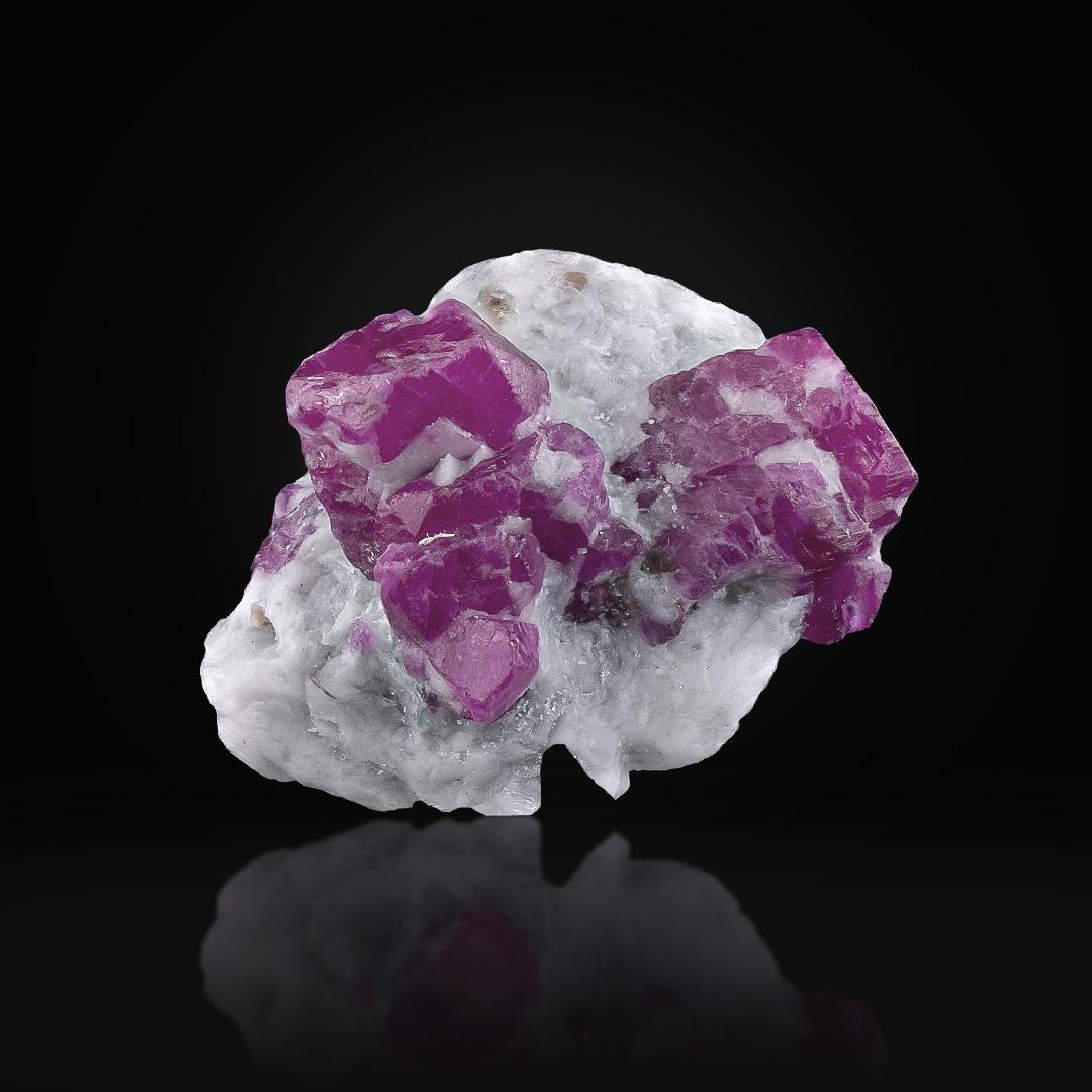 Specimen Type: Ruby on Marble 
Weight: 15 grams
Dimension: H: 2.8 x W: 2.8 x D: 2 cm 
Origin: Jagdalak Mine, Surobi District, Kabul Capital, Afghanistan 
Treatment: None




This natural specimen features vibrant ruby crystals beautifully embedded