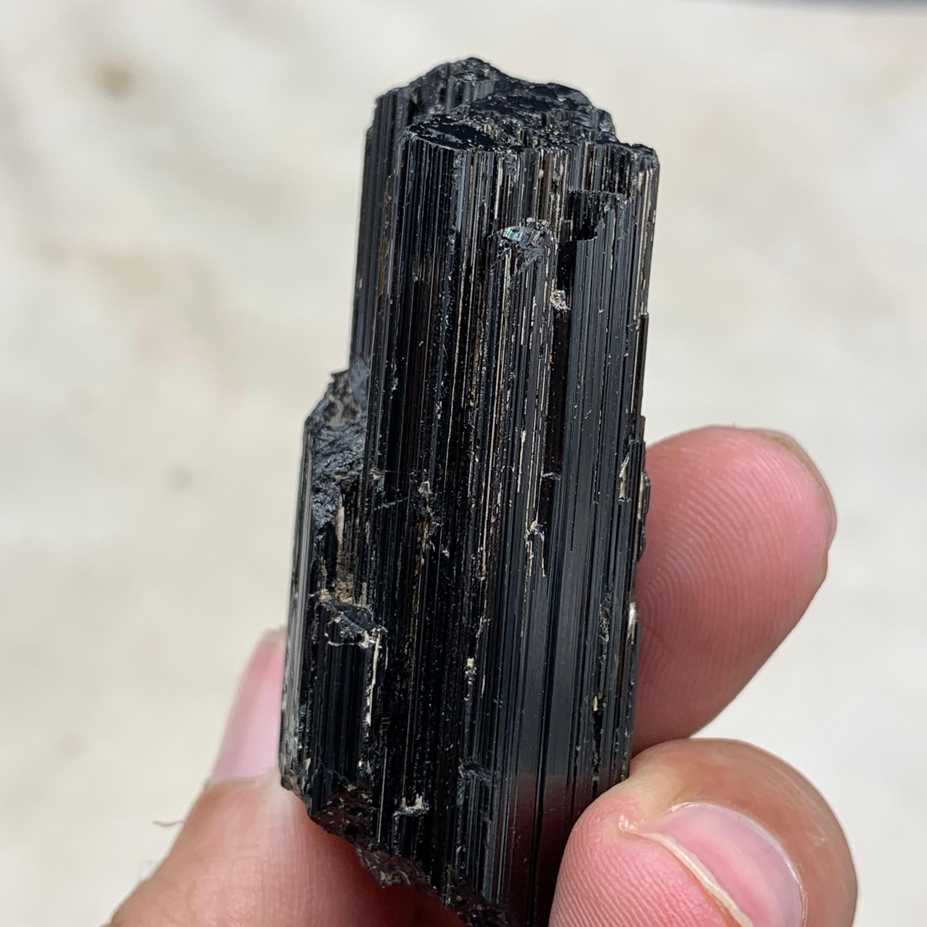PRODUCT INFORMATION:

Specimen Type: Spessartine Garnet Attached With black Tourmaline Crystal 
Weight: 42.20 Grams
Dimension: H: 5.1 x W: 2.6 x D: 2 Cm
Origin: Afghanistan 
Treatment: None

DESCRIPTION: 

This striking specimen features a vibrant