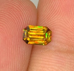 Natural Sphene Titanite Gemstone: 0.78 Carat Multi Color Emerald Cut
