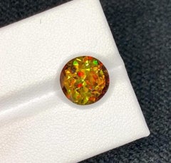 Natural Sphene Titanite Gemstone: 4.73 Carat Multi Color Round Cut For Jewelry